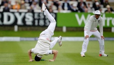 England’s Ben Stokes (watched closely by Stuart Broad)  is head over heels with delight after smashing  the fastest century at Lord’s and then helping to bowl England to a famous victory over New Zealand yesterday. Reuters / Philip Brown