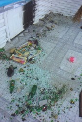 Debris left from the stones and bottles which were pelted at the Prasads’ home on May 11.