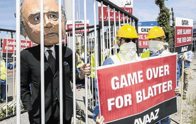 An activist wears a giant mask depicting FIFA President Sepp Blatter during a protest yesterday by the Avaaz.org organisation in Zurich, Switzerland, prior to today’s Fifa congress. Avaaz.org wants Blatter to be held accountable for the corruption at Fifa ENNIO LEANZA/EPA