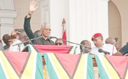 President David Granger waves to the crowd before his inaugural address at Parliament Buildings after his swearing in.