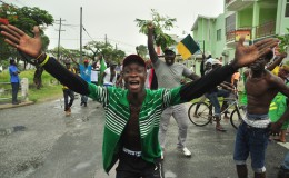 APNU+AFC supporters on Albert and Croal streets reacting after the preliminary results of the General and Regional Elections this afternoon showed that the group had won the elections. 
