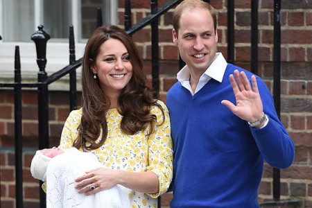 Britain’s Duchess of Cambridge Kate  and Prince William leave the hospital with their as yet unnamed daughter, some 12 hours after she was born.
