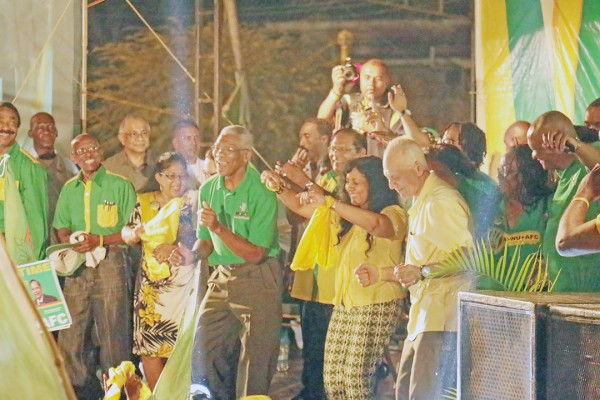 APNU+AFC  candidates and their families dancing at last night’s rally at the Square of the Revolution.