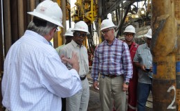 President David Granger (centre), being briefed on the operations of ExxonMobil’s oil rig, the Deepwater Champion (GINA photo)