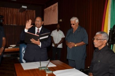 Moses Nagamootoo takes the oath as Prime Minister in the presence of President David Granger 