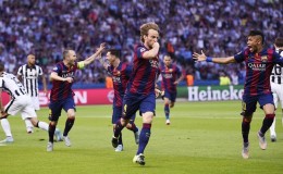 Ivan Rakitic celebrates with team mates after scoring the first goal for Barcelona. Reuters / Dylan Martinez