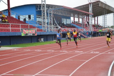 Rupert Perry (lane 5) winning the men’s 200m final yesterday at the National Track and Field Centre to complete the sprint double at the Athletic Association of Guyana’s National Senior Championships. Perry posted a season-best 21.1 seconds to take the event ahead of Davin Fraser (21.4s) and youth athlete, Compton Caesar in 21.7 seconds. 