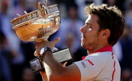 Stan Wawrinka of Switzerland poses with the trophy during the ceremony after winning the men’s final match against Novak Djokovic of Serbia at the French Open tennis tournament at the Roland Garros stadium in Paris, France,  yesterday.REUTERS/VINCENT KESSLER