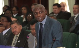 Foreign Minister Carl Greenidge making his statement on the maritime decree
