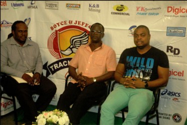 Chairman of the Boyce and Jefford Track and Field Committee, Colin Boyce (centre) makes a point in Linden during an interview with NCN’s Jonathan Craig (left). Co-Chairman, Edison Jefford is at right. 