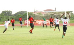  West Demerara Secondary’s Jeiel Jansen (3rd from right) scoring his team’s first and only goal during their hard-fought loss to L’Aventure Secondary in the Digicel Secondary School’s championship yesterday at the Leonora Sports Facility. (Orlando Charles photo)