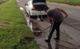 Brijraj Ramsaroop cleaning up along the
East Coast Highway
