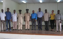 Commander Stephen Mansell (fifth from left), stands with Halim Khan (second from left) Patrick Chimedu Onwuzirike (sixth from left), Eon Nicholson (fourth from right) and representatives of D Division and the religious organisations at the orientation.
