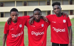 Kwakwani goal-scorers in chronological order from right to left- Linden James, Kevin Carter and Cassius Campbell posing for a photo opportunity following their win over Harmony Secondary
 