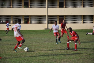 Action between Christianburg/Wismar Secondary and New Silver City in their semi-final affair at the Wisburg Secondary School ground  