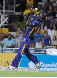 Jason Holder holds on to the catch to dismiss the #WorldBoss Chris Gayle