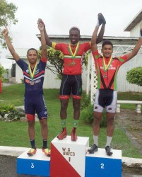 The top three men’s finishers of the National Road Race Championship are all smiles on the podium. Winner, Hamza Eastman is flanked by Geron Williams (left) and Alanzo Greaves (right).