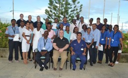 GPHC’s Chief Executive Officer (CEO), Michael Khan along with Dr. Zulfikar Bux, Director of Accident & Emergency, Dan Batsie, Head, Atlantic Emergency Medical Service training and the graduating students (GINA photo)