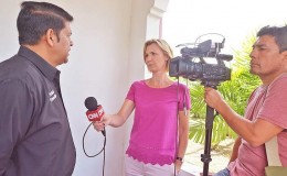 CNN correspondent Robyn Curnow and cameraman Jose Armijo interview Congress of the People (COP) leader Prakash Ramadhar after a press conference at COP’s Flagship House, St Clair, yesterday.