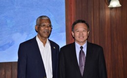 President David Granger (left) and Ambassador Liu Huanxing, Special Envoy, Caribbean Affairs, Ministry of Foreign Affairs, China, taking a photo opportunity before the meeting at the Ministry of the Presidency (GINA photo)