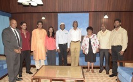 President David Granger (fourth from right) and Minister of Governance Raphael Trotman (left) along with members of the Indian Arrival Committee (IAC) during a meeting today at the Ministry of the Presidency. Minister of Social Cohesion, Amna Ally is third from right.  IAC executive Neaz Subhan is second from right. (GINA photo)