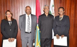 The two Puisne judges, Jo-Ann Barlow (right) and Priya Sewnarine –Beharry (left ) with President David Granger (second from right) and Chancellor of the Judiciary (ag) Carl Singh 