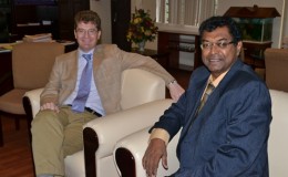 British High Commissioner to Guyana Greg Quinn (left) and Minister of Public Security Khemraj Ramjattan during a courtesy call the diplomat paid to the minister - June 4, 2015. (GINA photo)