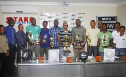 The various team and individual winners alongside members of the GABA executive displaying their prizes following the conclusion of the presentation ceremony held at the Starr Computers Conference Room on Brickdam.