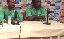 From left: Guyana Amazon Warriors skipper Denesh Ramdin  and head coach Carl Hooper at a CPL press conference in St Kitts yesterday.