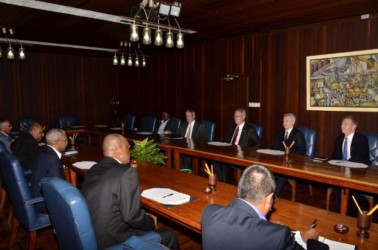 The Guyanese team, led by President David Granger, meeting with ExxonMobil’s top officials on Monday. (Government Information Agency photo)