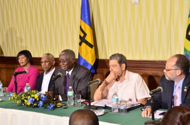 From left at the press conference on Saturday in Barbados are Jamaican Prime Minister, Portia Simpson Miller; Guyana’s President, David Granger; CARICOM Chairman, Barbadian Prime Minister Freundel Stuart; St Vincent and the Grenadines Prime Minister, Ralph Gonsalves and CARICOM Secretary General Irwin laRocque. (Ministry of the Presidency photo) 