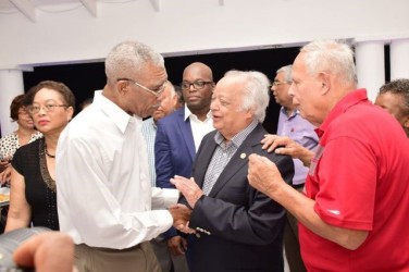 President David Granger (left) sharing a light moment with Sir Shridath Ramphal (second from right), and Frank Da Silva (right) during a cocktail reception at the home of Guyana’s Consul-General Michael Brotherson (GINA photo)
