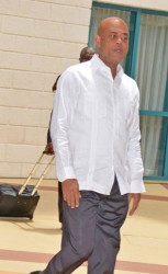 Haiti’s President Michel Martelly as he left the Caricom Summit (Photo by Nigel Browne/Barbados Nation)