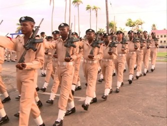 Police officers marching (GINA photo)