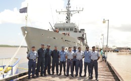 The recently trained coast guards with the training vessel (GDF photo)
