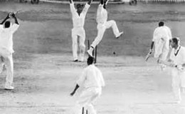 The West Indies players celebrate as Joe Solomon’s throw breaks the stumps to record the first tied test match in cricket history during the 1960 tour of Australia.