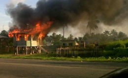  The house on fire at Melanie Damishana, East Coast Demerara.
