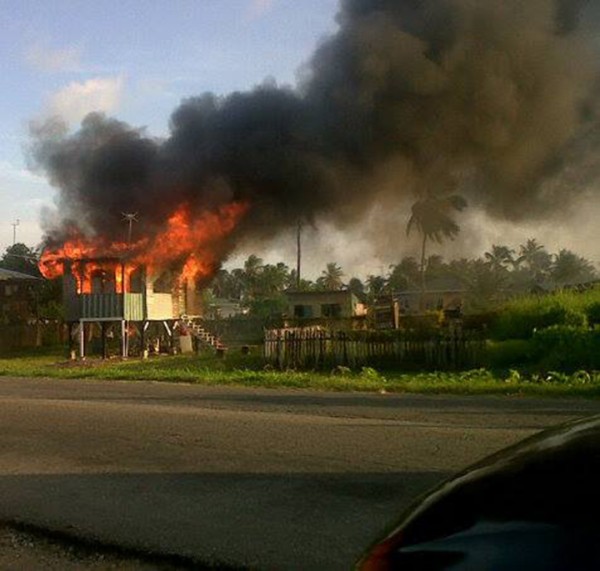  The house on fire at Melanie Damishana, East Coast Demerara. 