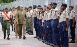 National Security Minister Carl Alfonso inspects the troops at the T&T Cadet Force’s annual camp at the Barataria North Secondary School on Sunday. (Photo: Trinidad Express/Ishmael Salandy)