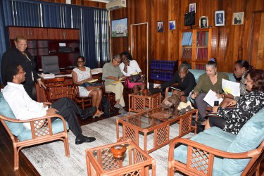 Attorney General Basil Williams (left) at the meeting with the representatives of the NGOs (Ministry of Legal Affairs photo) 