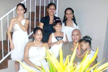 WEDDING DAY: Jamie Fitzworme, front left, and Gregory Fitzworme with relatives on their weding day in 2013.