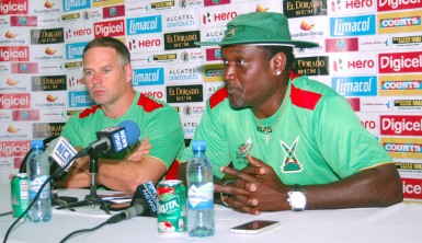 Brad Hodge and Carl Hooper speak to the media during yesterday’s press conference. (Orlando Charles photo) 