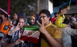 Iranians gesture as they celebrate in the street following a nuclear deal with major powers, in Tehran July 14, 2015. REUTERS/TIMA