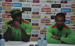 Coach Carl Hooper (left) and Captain Denesh Ramdin engaged with the local media during yesterday’s press briefing