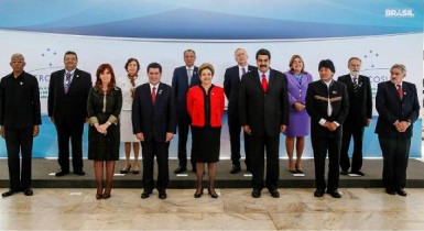 President David Granger (far left) stands among South American leaders at the Mercusor Summit in Brasilia (Photo via the Government Information Agency)