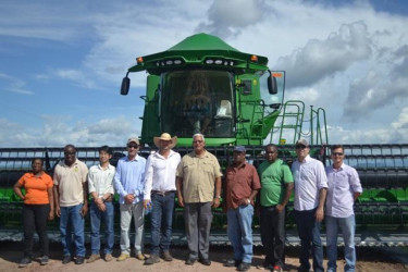 Agriculture Minister Noel Holder (fourth from right) flanked by official and farmers in Brazil (GINA photo) 