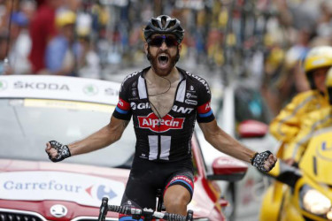 Giant-Alpecin rider Simon Geschke of Germany celebrates as he crosses the finish line to win the 161-km (100 miles) 17th stage of the 102nd Tour de France cycling race from Digne-les-Bains to Pra Loup in the French Alps mountains, France.