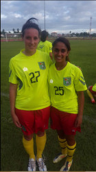  Lady Jaguars Scorers Donna Joseph (left) and Ashley Savona pose for a photo opportunity following their practice match against a Georgetown u-17 select team at the Leonora Sports Facility