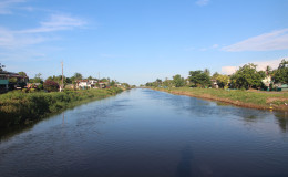  Sparkling clean: A swollen canal in the village
