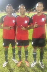 Christianburg/Wismar Secondary goal scorers from left to right Omar Brewley, Kendolph Lewis and Dequan Hercules pose for a photo opportunity following their lopsided semi-final win over Waramadong Secondary.